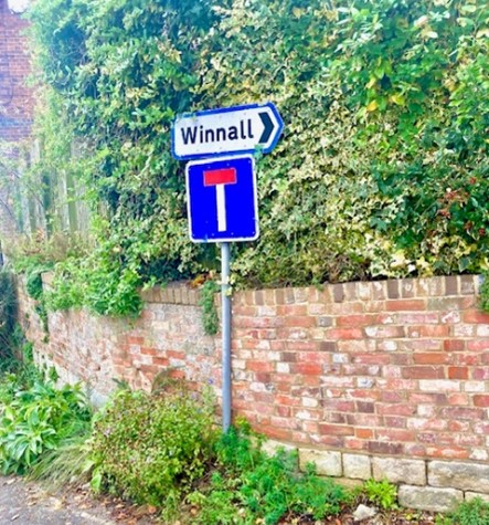 crossroads and the sign for a dead end 